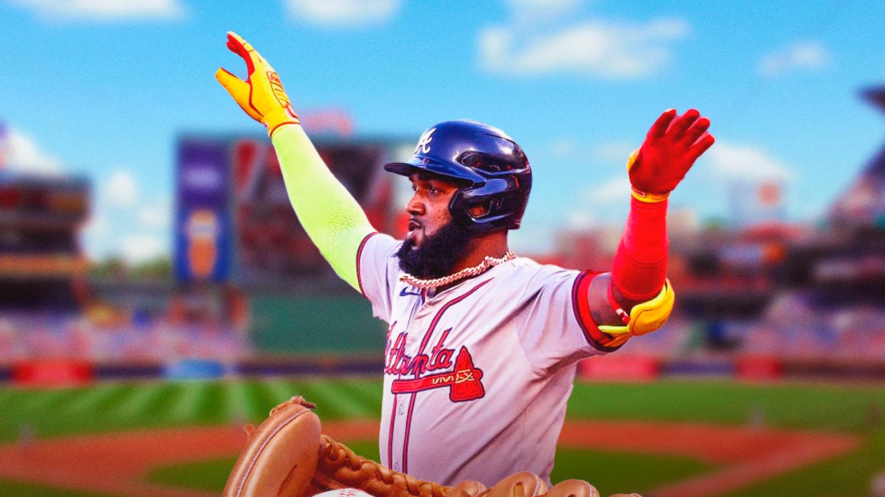 Marcell Ozuna wearing Braves uniform celebrating.