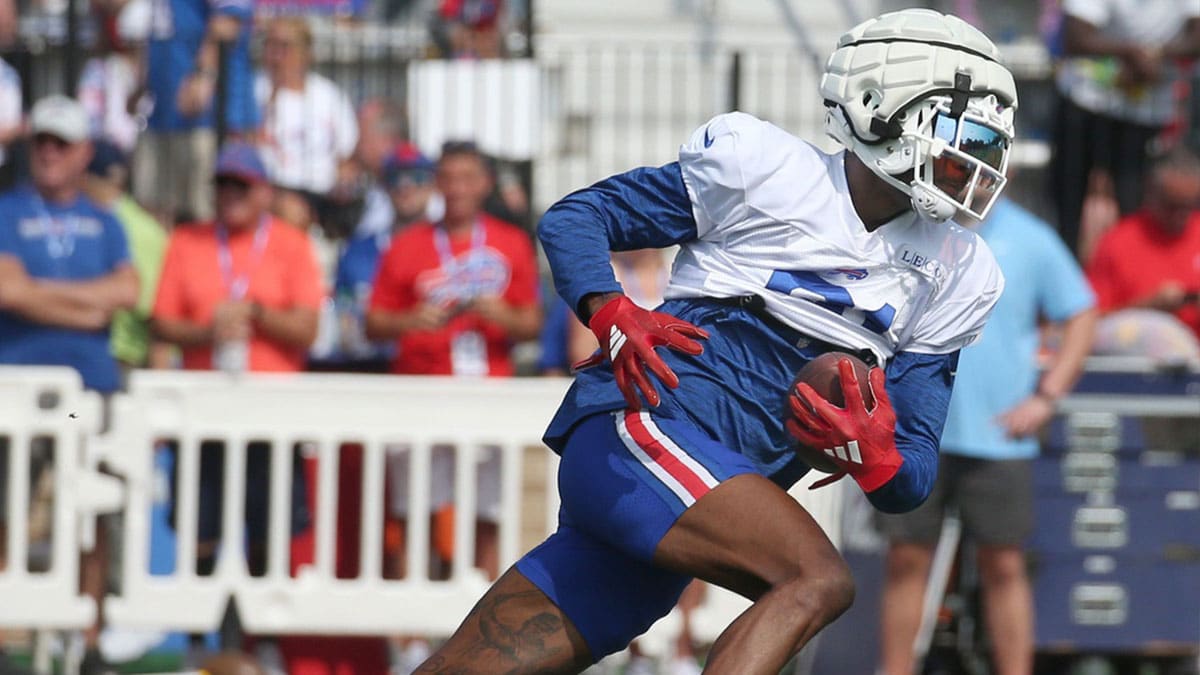 Bills wide receiver Marquez Valdes-Scantling pulls in a pass and races upfield during route drills.