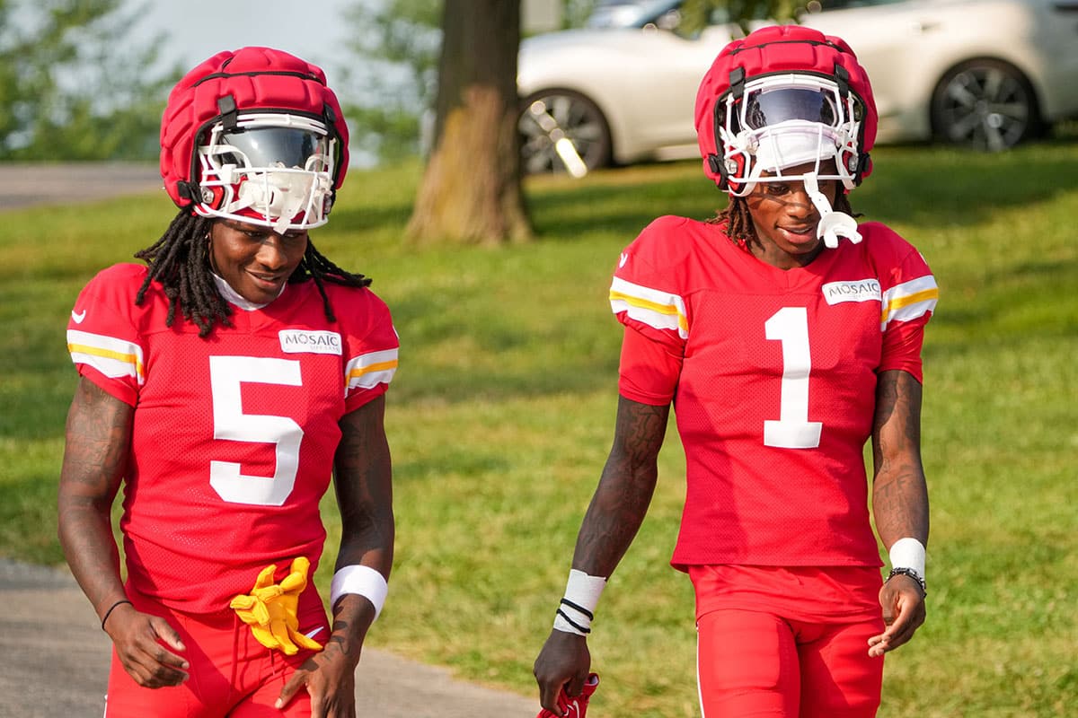 Kansas City Chiefs wide receiver Marquise “Hollywood” Brown (5) and wide receiver Xavier Worthy (1) walk down the hill from the locker room to the fields during training camp at Missouri Western State University. 