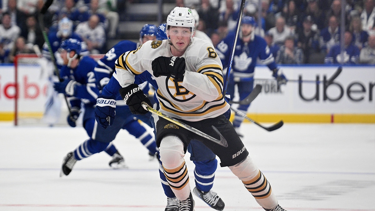 Boston Bruins defenseman Mason Lohrei (6) pursues the puck against the Toronto Maple Leafs in the third period in game six of the first round of the 2024 Stanley Cup Playoffs at Scotiabank Arena.