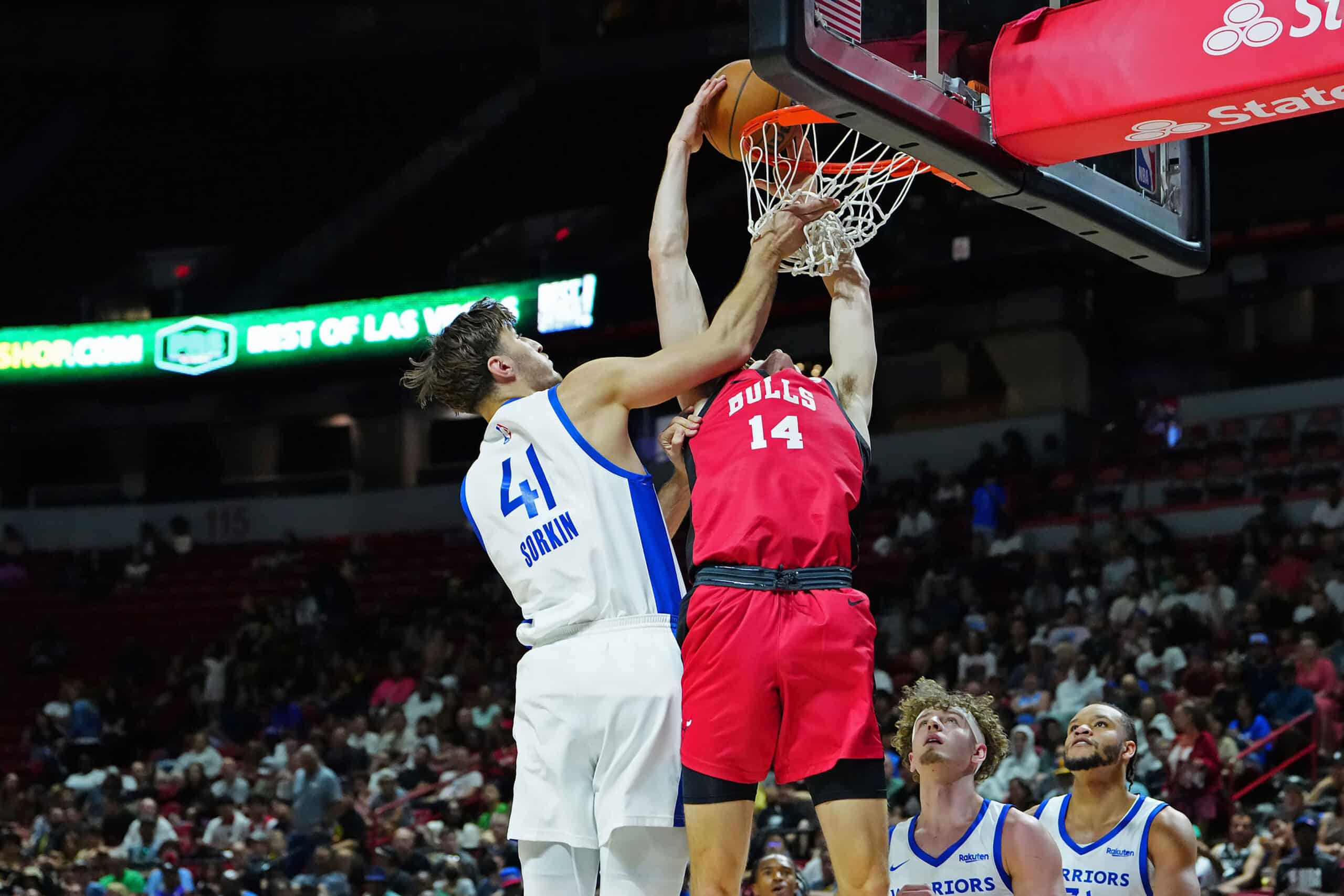 Chicago Bulls forward Matas Buzelis (14) dunks against Golden State Warriors center Roman Sorkin (41) during the first quarter at Thomas & Mack Center.