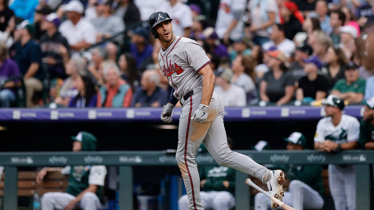 Atlanta Braves first baseman Matt Olson (28) reacts after hitting a grand slam in the third inning against the Colorado Rockies at Coors Field.