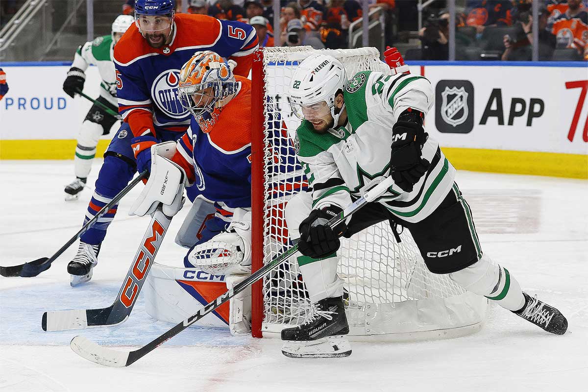 Dallas Stars forward Mavrik Bourque (22) tires to yuck a puck pas Edmonton Oilers goaltender Stuart Skinner (74) during the second period in game six of the Western Conference Final of the 2024 Stanley Cup Playoffs at Rogers Place.