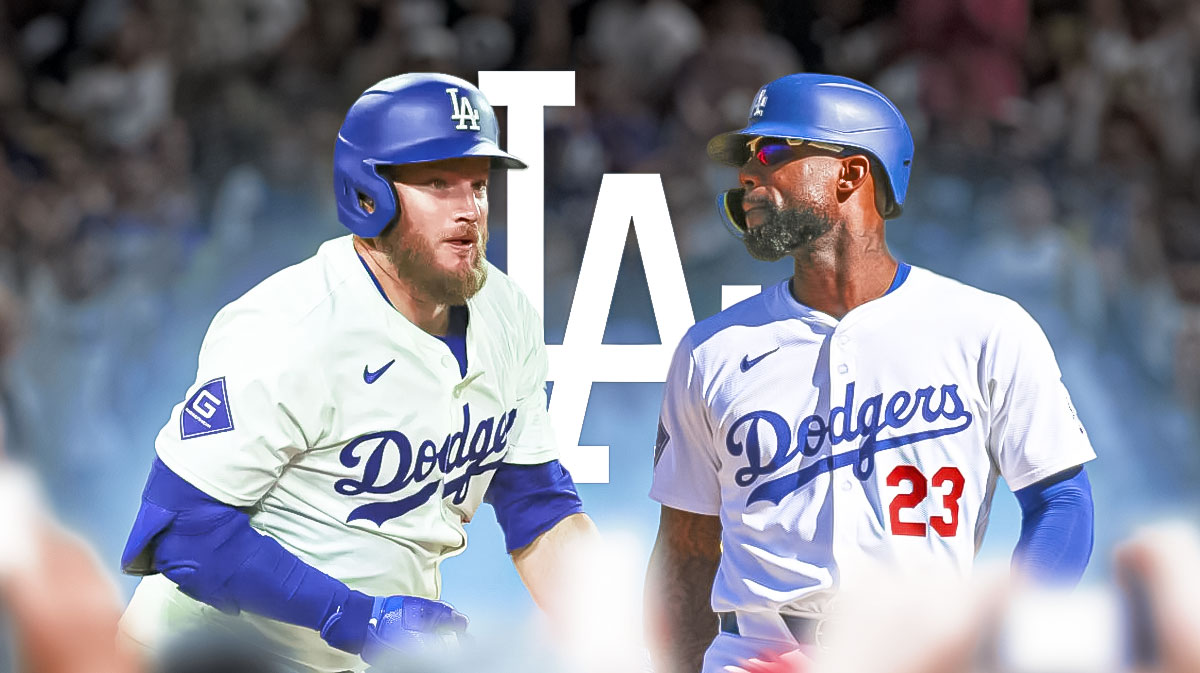Dodgers third baseman Max Muncy smiling next to Dodgers outfielder Jason Heyward with a Los Angeles Dodgers logo in the background