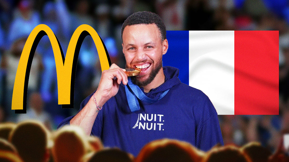 Team USA's Steph Curry smiling with a gold medal around his neck next to the French flag with the McDonald's logo next to it