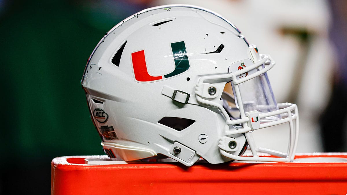 Miami Hurricanes helmet sits on bench as the Hurricanes play against the North Carolina Tar Heels at Kenan Memorial Stadium.