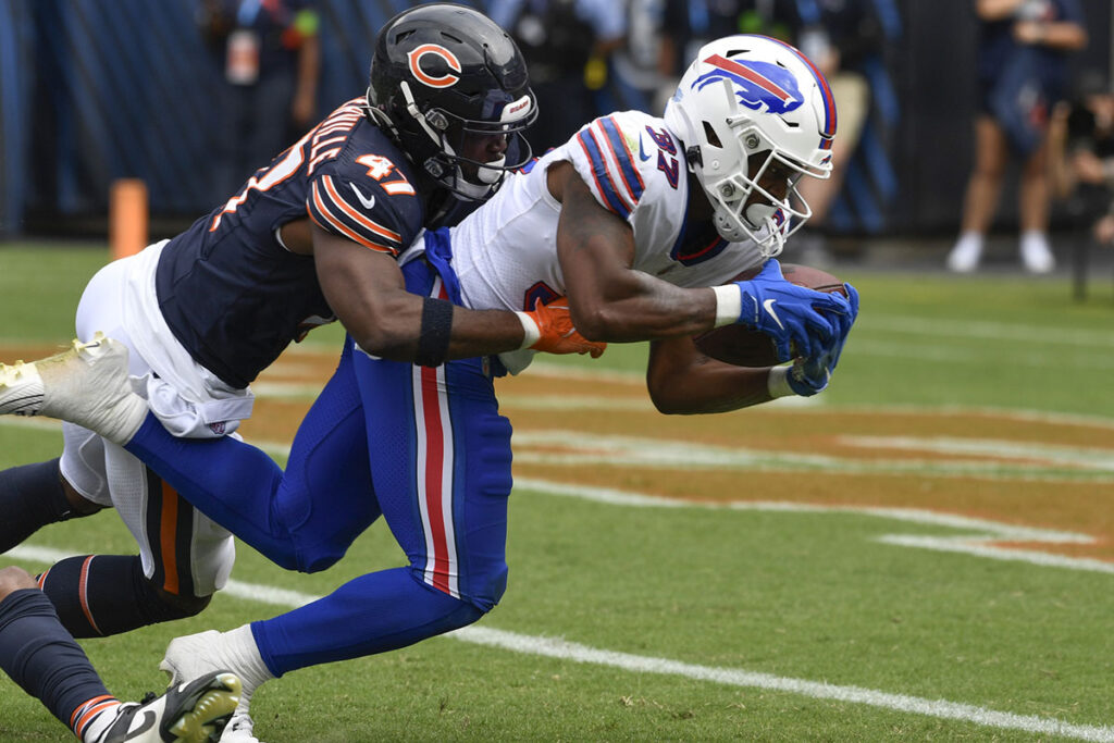 Buffalo Bills running back Darrynton Evans (37) runs for a touchdown against Chicago Bears linebacker Micah Baskerville (47) during the second half at Soldier Field. 