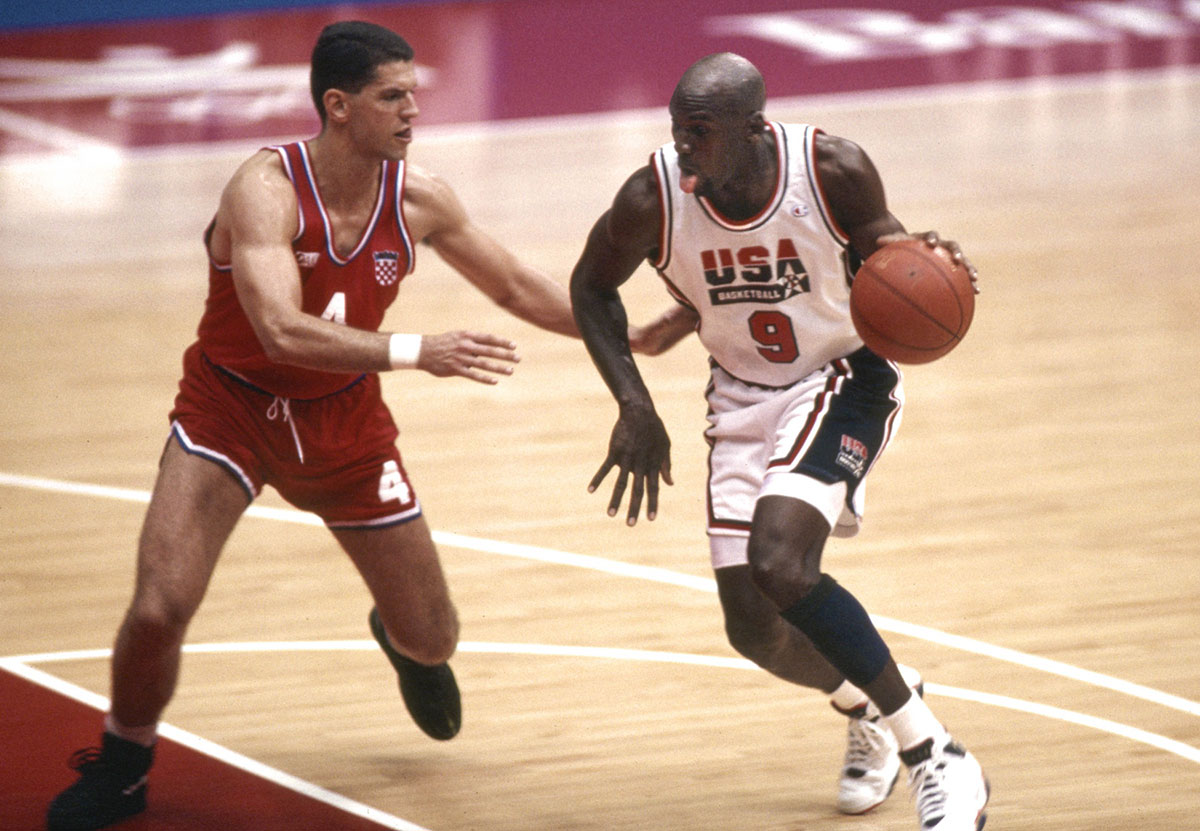 USA Dream Team guard Michael Jordan (9) is defended by Croatia guard Drazen Petrovic (4) in the mens basketball gold medal game during the 1992 Barcelona Olympic Games at Pavello Olympic Arena.