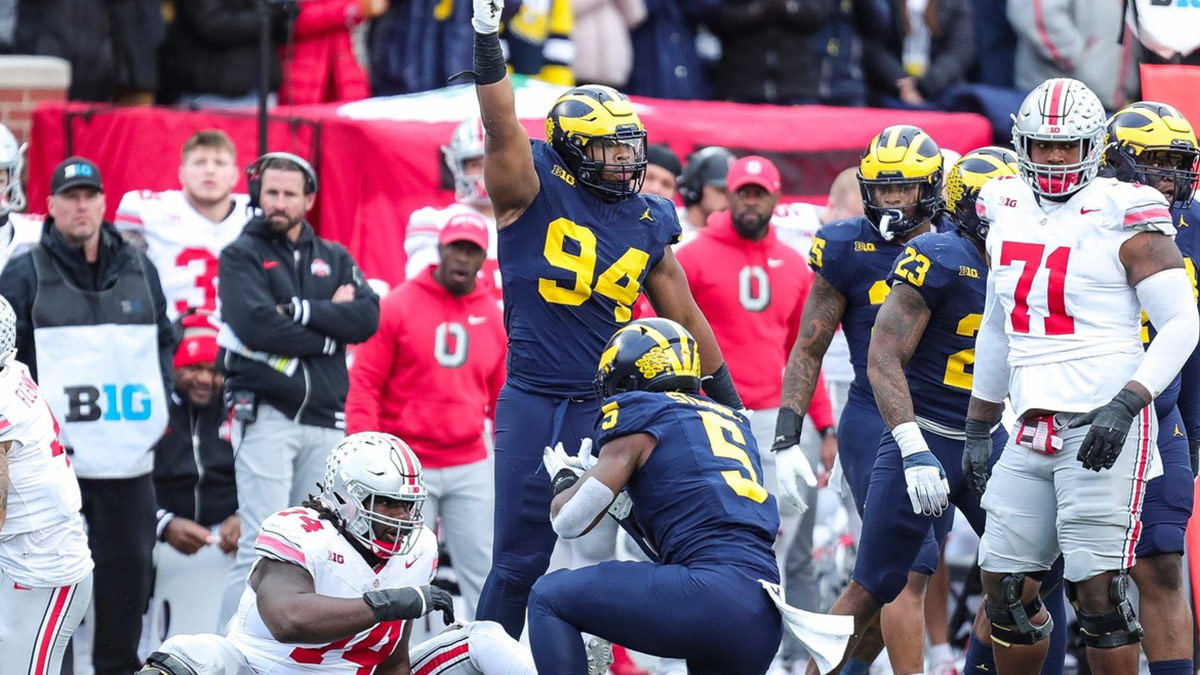 Caption: Michigan defensive lineman Kris Jenkins (94) celebrates a tackle against Ohio State during the Wolverines 30-24 win in Ann Arbor.