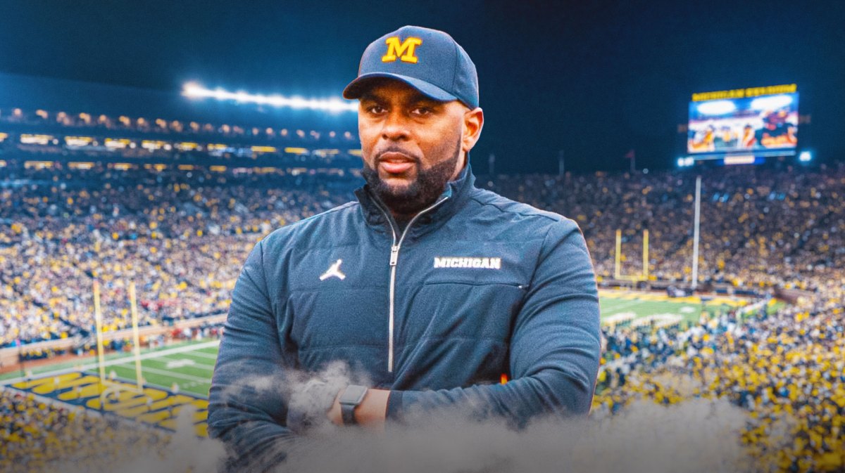 Michigan football, Wolverines, Sherrone Moore, 2024 Michigan football, Michigan football predictions, Sherrone Moore with Michigan football stadium in the background