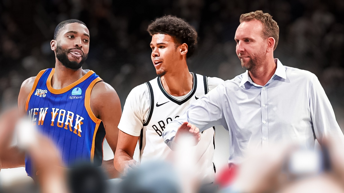 Photo: Mikal Bridges in Knicks jersey smiling looking at Cam Johnson in Nets jersey, Sean Marks