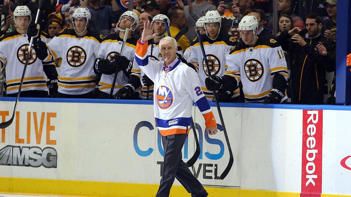 New York Islanders legend Mike Bossy is honored before a game against the Boston Bruins at Nassau Veterans Memorial Coliseum.