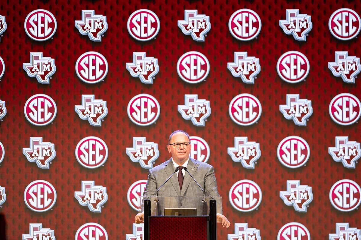 Texas A&M head coach Mike Elko speaking at Omni Dallas Hotel.