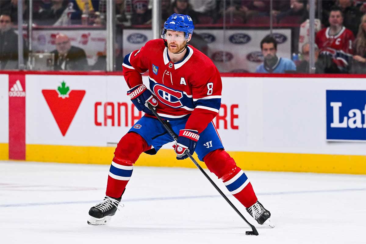 Montreal Canadiens defenseman Mike Matheson (8) plays the puck against the Tampa Bay Lightning during the first period at Bell Centre.
