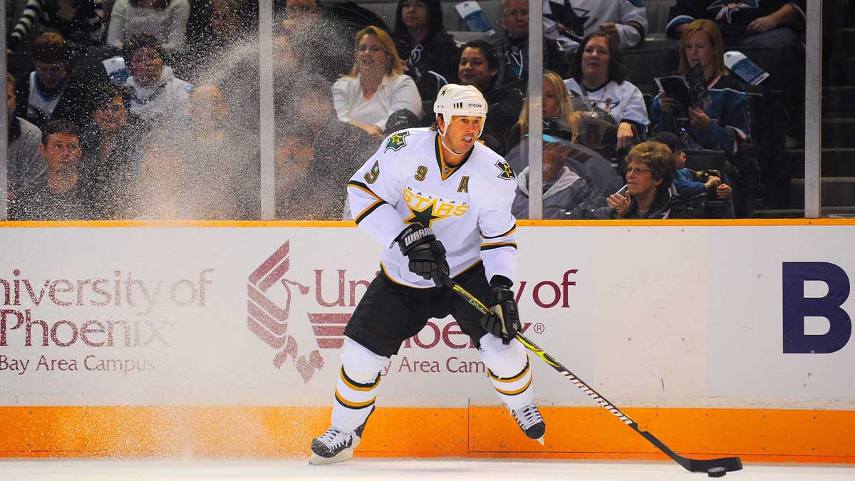 Dallas Stars center Mike Modano (9) controls the puck during the first period against the San Jose Sharks at HP Pavilion in San Jose, CA. The Stars defeated the Sharks 4-1.
