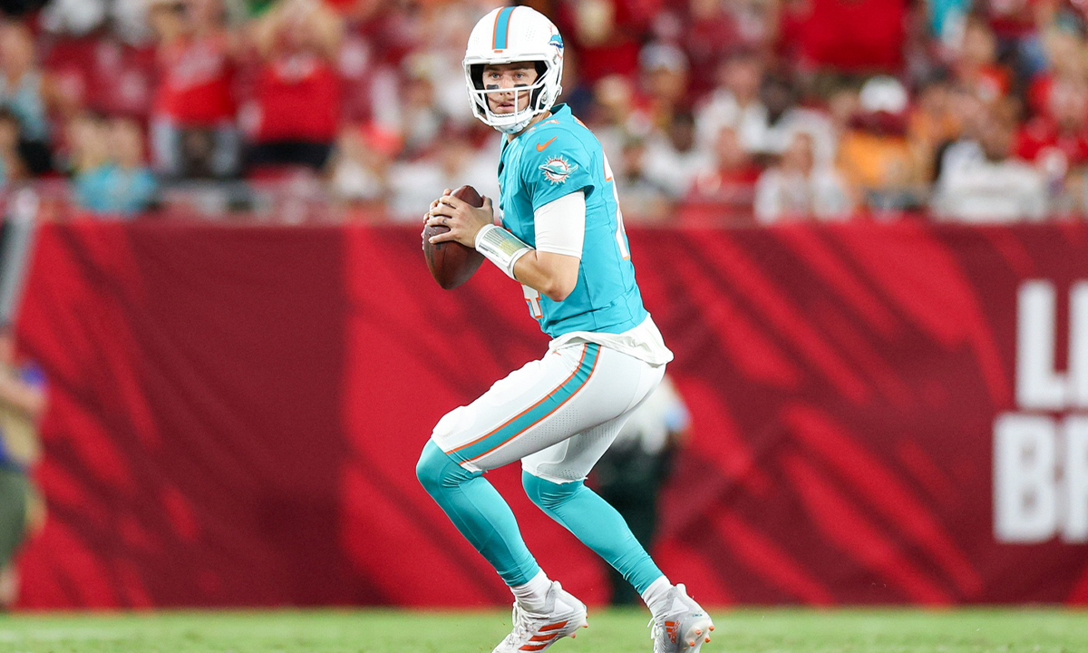 Miami Dolphins quarterback Mike White (14) drops back to pass against the Tampa Bay Buccaneers in the first quarter during preseason at Raymond James Stadium.