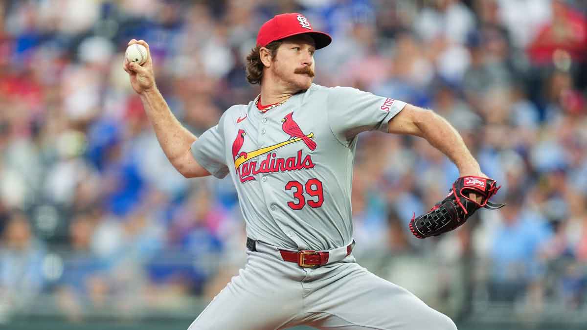 Aug 9, 2024; Kansas City, Missouri, USA; St. Louis Cardinals starting pitcher Miles Mikolas (39) pitches during the third inning against the Kansas City Royals at Kauffman Stadium.