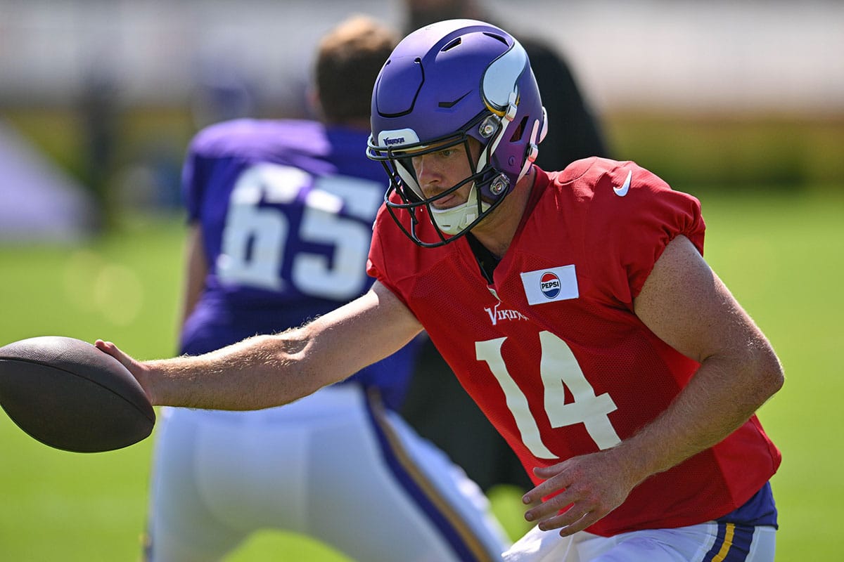 Minnesota Vikings quarterback Sam Darnold (14) warms up during practice at Vikings training camp in Eagan, MN. 