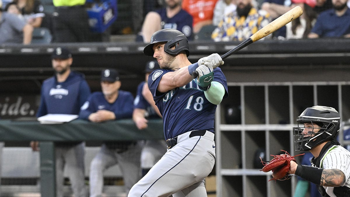 Seattle Mariners designated hitter Mitch Garver (18) hits an RBI double against the Chicago White Sox during the first inning at Guaranteed Rate Field. 