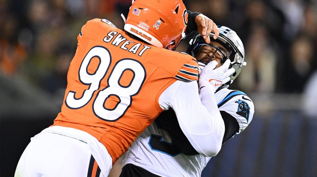Chicago Bears defensive lineman Montez Sweat (98) applies pressure to Carolina Panthers quarterback Bryce Young (9) in the first half forcing an incomplete pass at Soldier Field.
