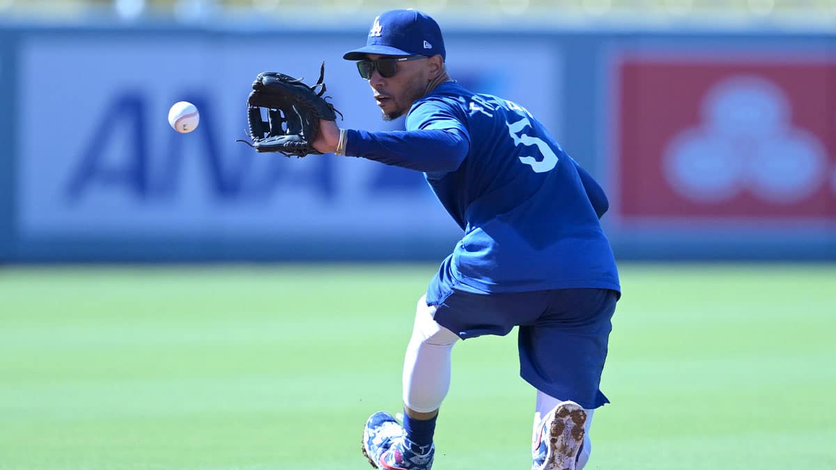 Los Angeles Dodgers second baseman Mookie Betts (50) fields ground balls prior to the game against the Philadelphia Phillies at Dodger Stadium. Dodger players wore #MaxStrong shirts during pregame to honor Max, the 3-year old son of first baseman Freddie Freeman (5), who was diagnosed with Guillian-Barre syndrome.