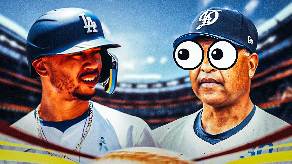 Dodgers manager Dave Roberts with big emoji eyes looking at Mookie Betts.