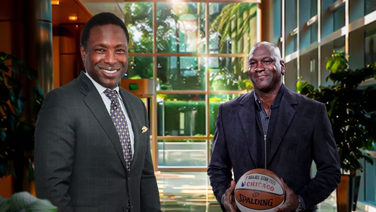Avery Johnson beside Michael Jordan.
