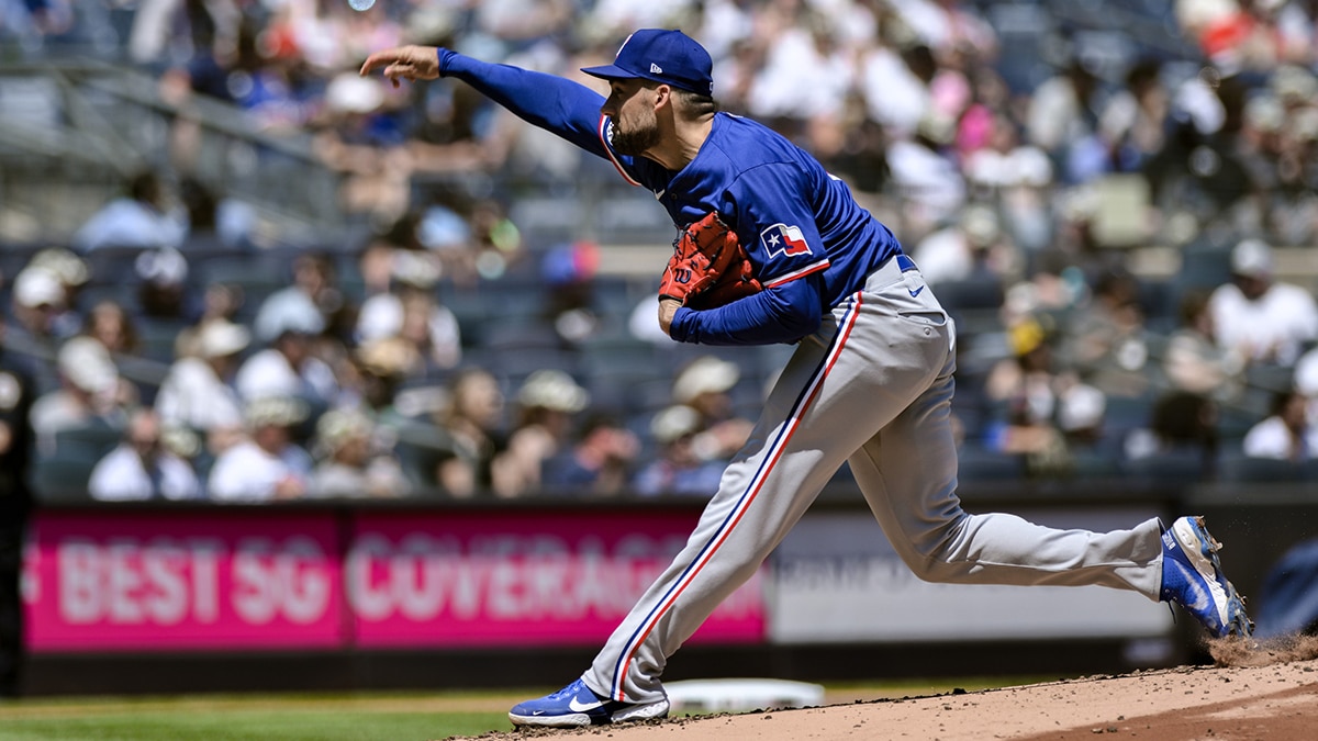 Texas Rangers pitcher Nathan Eovaldi (17) pitches against the New York Yankees during the first inning at Yankee Stadium.