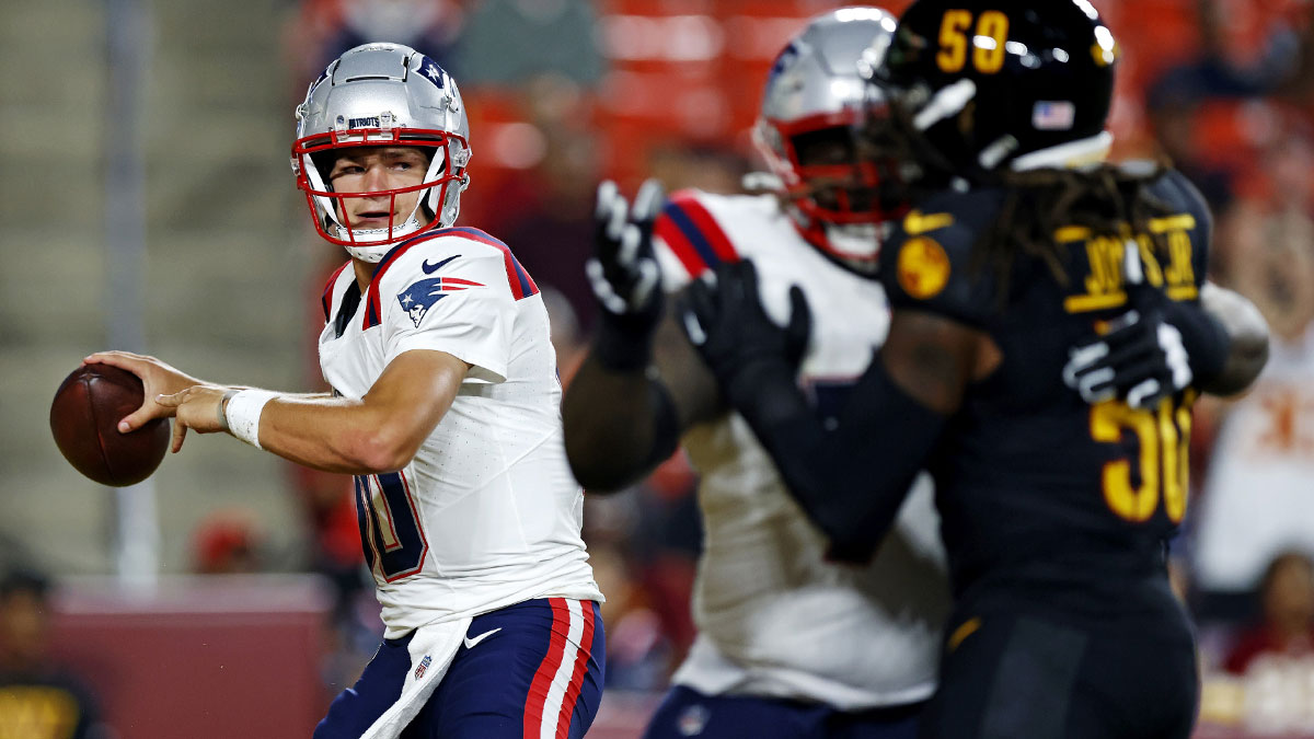 New England Patriots quarterback Drake Maye (10) throws a pass against the Washington Commanders in the first quarter of a preseason game at Commanders Field. 