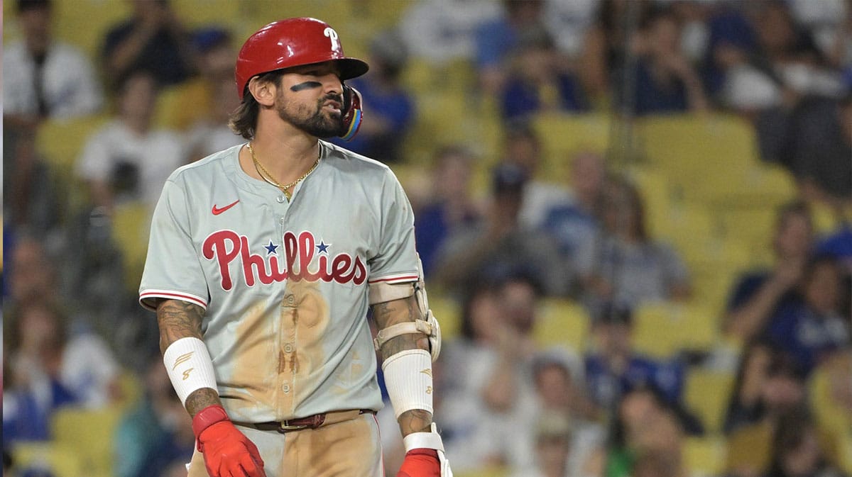 Philadelphia Phillies right fielder Nick Castellanos (9) reacts after he was hit by a pitch in the eighth inning by Los Angeles Dodgers relief pitcher Michael Grove (29) at Dodger Stadium.