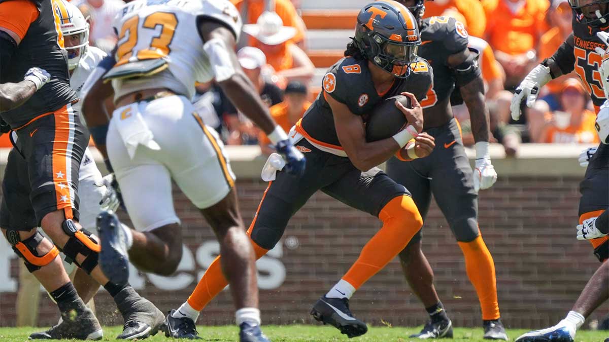 Tennessee quarterback Nico Iamaleava (8) runs with the ball during a football game between Tennessee and Chattanooga at Neyland Stadium in Knoxville, Tenn., on Saturday, August 31, 2024.