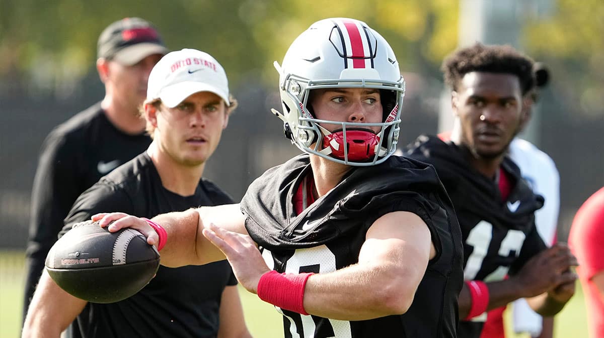 Ohio State Buckeyes quarterback Will Howard (18) throws during football camp at the Woody Hayes Athletic Complex.