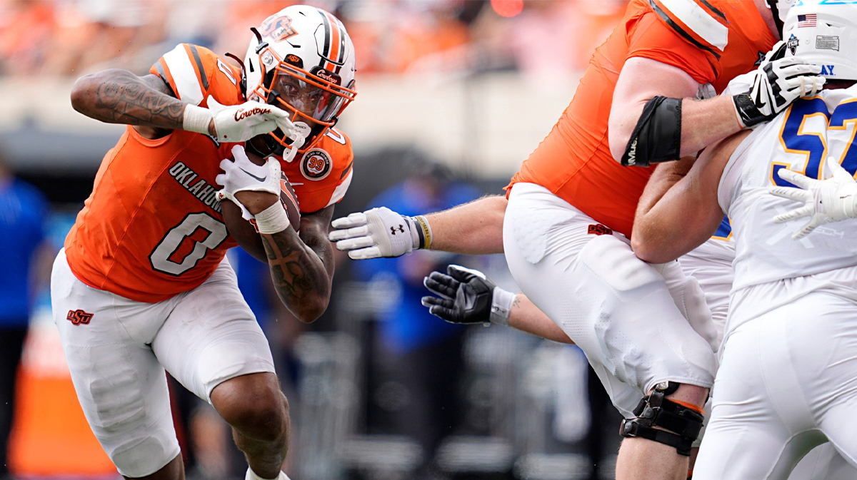 Oklahoma State's Ollie Gordon II (0) rushes in the second half of the college football game between the Oklahoma State Cowboys and South Dakota State Jackrabbits at Boone Pickens Stadium in Stillwater, Okla., Saturday, Aug., 31, 2024.