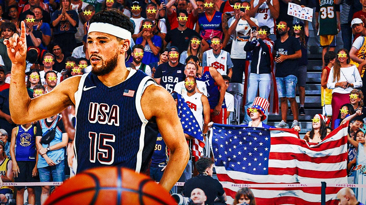 Devin Booker on one side, a bunch of Team USA fans on the other side with stars in their eyes