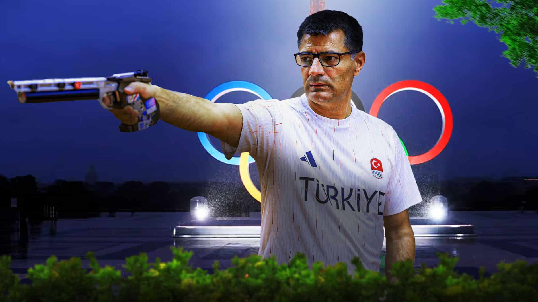 Yusuf Dikec iconic pose with the Olympic logo in the background.