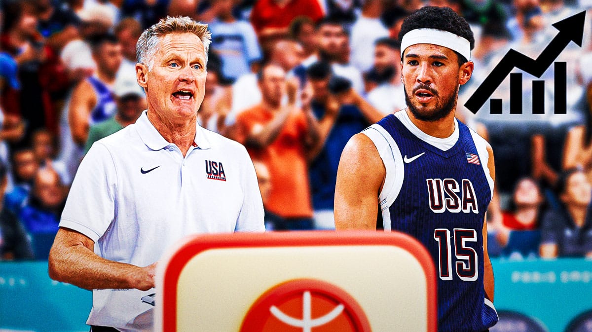 Steve Kerr smiling at Team USA's Devin Booker, with the stock up logo all over Booker