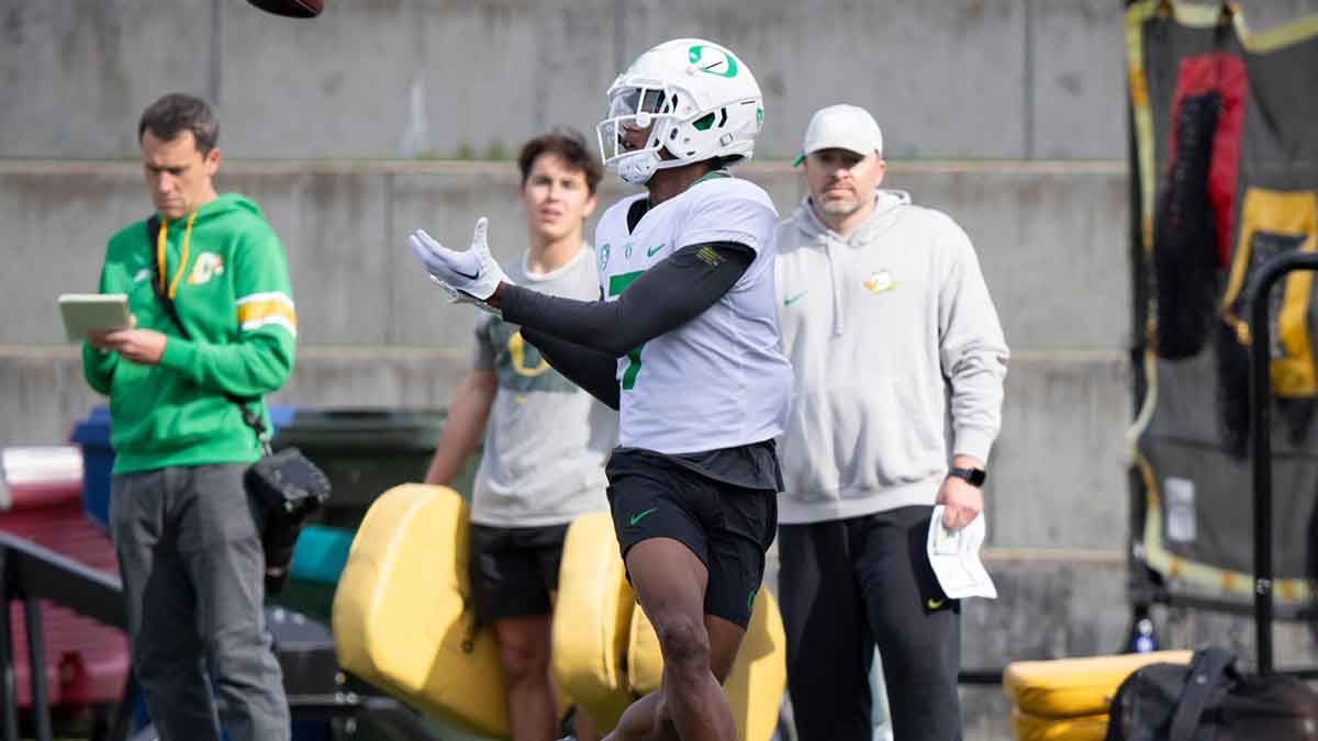 Oregon wide receiver Evan Stewart hauls in a pass during practice with the Ducks.