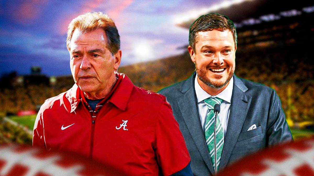 NCAA coach Nick Saban next to coach Dan Lanning