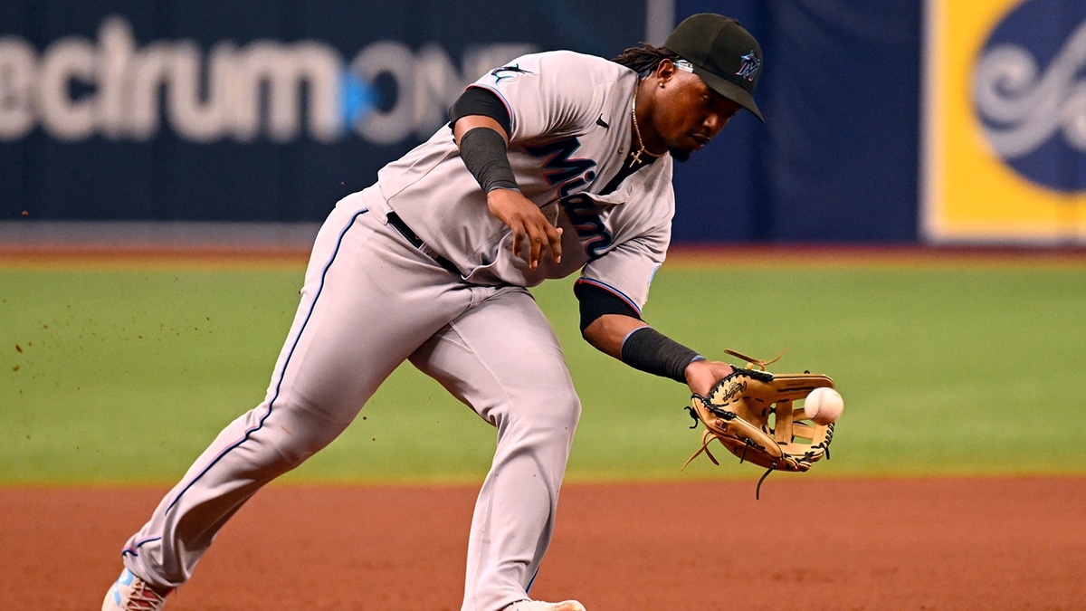 Miami Marlins third baseman Jean Segura (9) fields a ground ball in the fourth inning against the Tampa Bay Rays at Tropicana Field. 