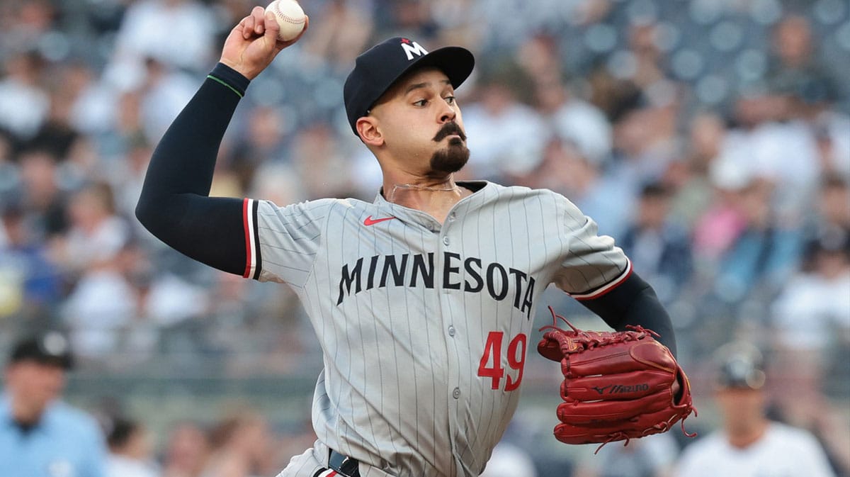 Minnesota Twins starting pitcher Pablo Lopez (49) delivers a pitch during the first inning against the New York Yankees at Yankee Stadium.