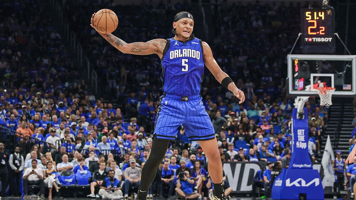 Orlando Magic forward Paolo Banchero (5) catches a pass against the Cleveland Cavaliers during the second quarter of game three of the first round for the 2024 NBA playoffs at Kia Center. 