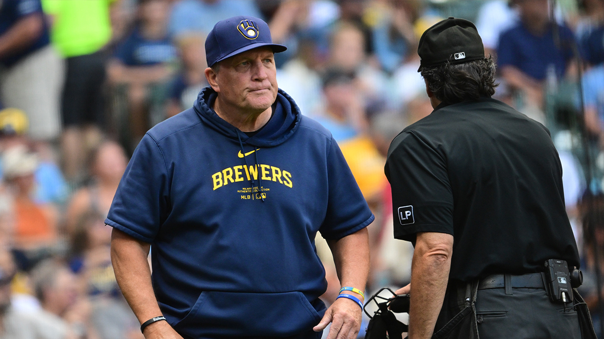 Aug 11, 2024; Milwaukee, Wisconsin, USA; Milwaukee Brewers manager Pat Murphy talks to home plate umpire Phil Cuzzi in the sixth inning against the Cincinnati Reds at American Family Field.