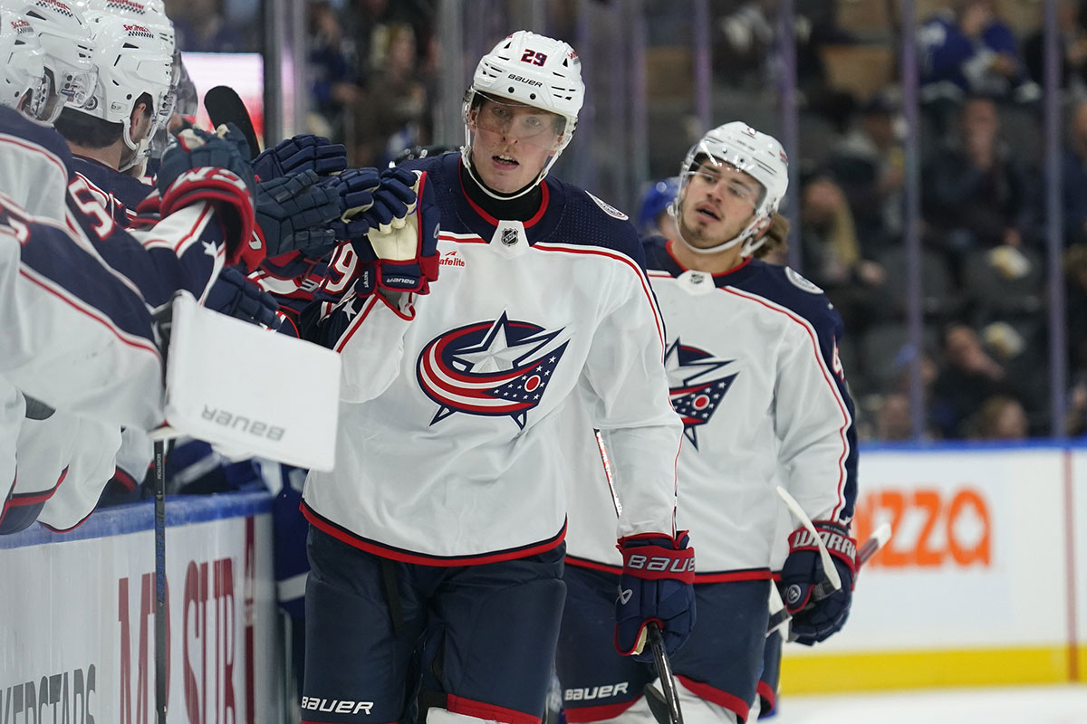 Columbus Blue Jackets forward Patrik Laine (29) gets congratulated after scoring against the Toronto Maple Leafs during the first period at Scotiabank Arena.