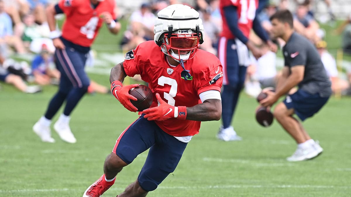 New England Patriots wide receiver DeMario Douglas (3) runs after the catch during training camp at Gillette Stadium.