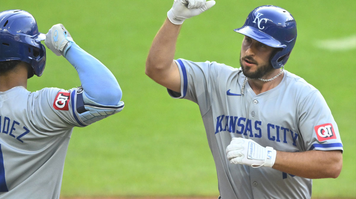 Kansas City Royals third baseman Paul DeJong (15) celebrates his solo home run with left fielder MJ Melendez (1) in the second inning against the Cleveland Guardians at Progressive Field.