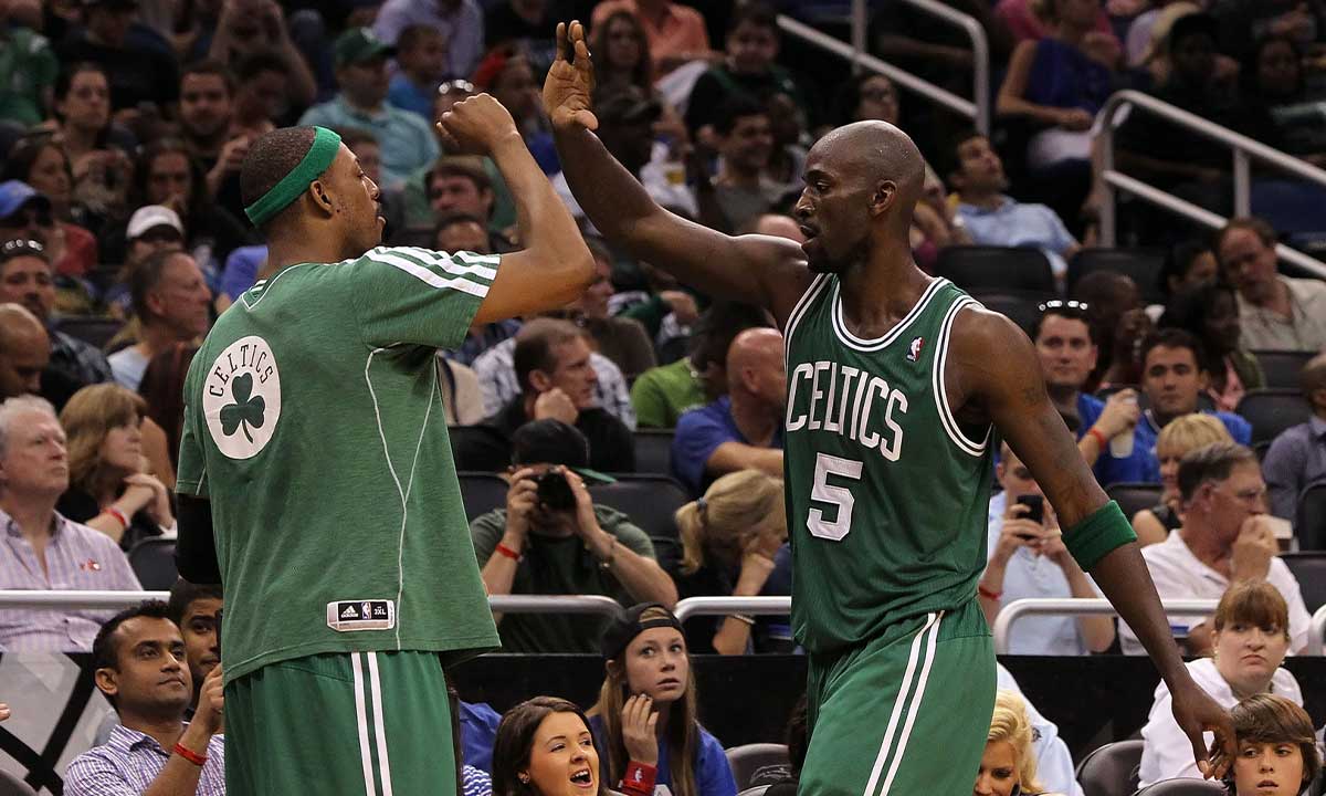 Paul Pierce (34) and center Kevin Garnett (5) congratulate each other