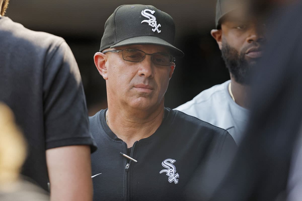 Chicago White Sox manager Pedro Grifol walks through the dugout after losing to the Minnesota Twins at Target Field