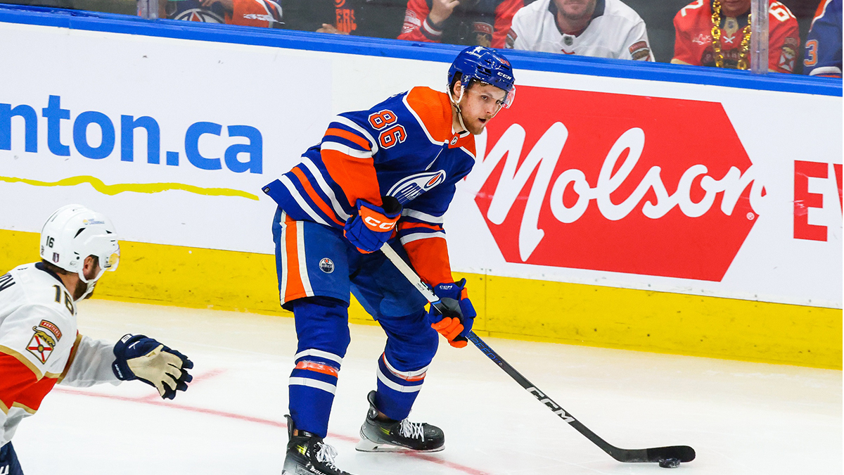 Edmonton Oilers defenseman Philip Broberg (86) controls the puck against the Florida Panthers during the second period in game four of the 2024 Stanley Cup Final at Rogers Place.