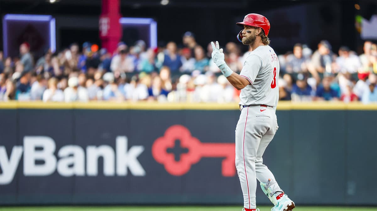 Philadelphia Phillies first baseman Bryce Harper (3) reacts towards the dugout after hitting a double against the Seattle Mariners during the fourth inning at T-Mobile Park. 