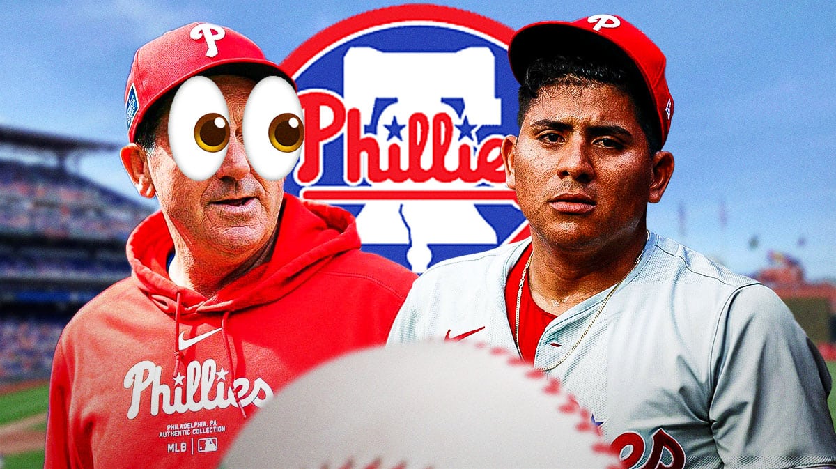 Phillies Rob Thompson with emoji eyes in his eyes looking at Ranger Suarez